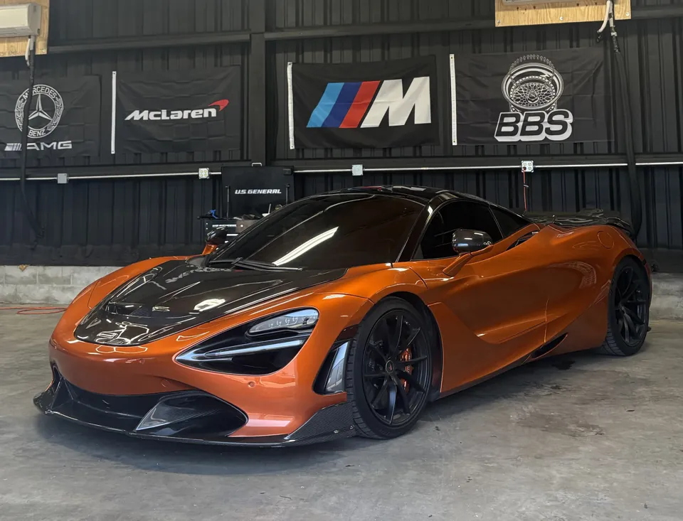 Orange McLaren in the workshop, from ShadeX’s website